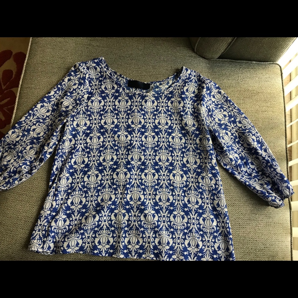 Blue print top with button down back